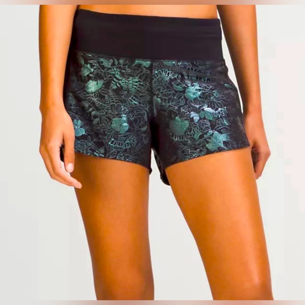 NWOT Lululemon “Speed Up short” 4”, logo Flourish Black iridescent foil, size 4